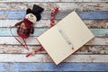 Open Journal, pen, and snowman Royalty Free Stock Photo