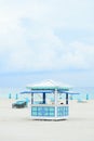 Open kiosk, sunbeds and sunshades at South beach, Miami, Florida, USA Royalty Free Stock Photo