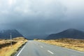 Open 2 lane road in rural countryside. Weather change in Scottish Highlands. Glencoe, Scotland Royalty Free Stock Photo