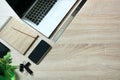 Open laptop and messthetics objects on office wooden desk table. Top view. Royalty Free Stock Photo