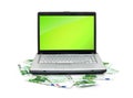 Open laptop with money Royalty Free Stock Photo