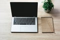 Open laptop on office wooden desk table. Top view, copy space. Royalty Free Stock Photo