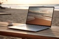 Open laptop on wooden table. Work space outdoors with view on the ocean. Office on the beach. Generative AI Royalty Free Stock Photo