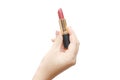 Open lipstick in a female hand