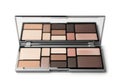 Open makeup palette with multiple neutral eyeshadow and blush shades isolated on white background Royalty Free Stock Photo