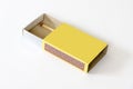 Matchbox with last match on white background. Royalty Free Stock Photo