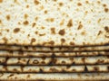 Open packing of baked matzo is laid out on the table.