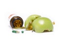 OPEN MEDICINE BOTTLE WITH GREEN APPLE Royalty Free Stock Photo