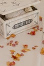 Memory box with dried rose petals and lace Royalty Free Stock Photo