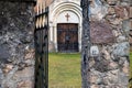 open metal gate and walkway leading to the entrance to the church, selective focus Royalty Free Stock Photo