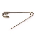 Open metal safety pin on white background Royalty Free Stock Photo