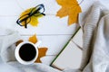 Open mockup book, coffee cup and glasses on wooden background Royalty Free Stock Photo