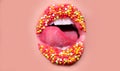 Open mouth with red female lips and tongue. Woman sweets icon on pink skin background. Facial expression