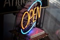 Open Neon sign in antique store Royalty Free Stock Photo