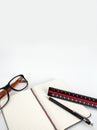 Note pad with pen, ruler and glasses Royalty Free Stock Photo