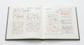 Open notebook features sketches of mobile and web interfaces, illustrating UI UX Royalty Free Stock Photo