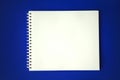 Open notebook flat lay photo. Notepad with blank page top view. Sketchbook spread