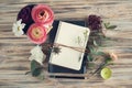 Open notebook and flower decor Royalty Free Stock Photo