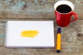 Open notebook with handwritten drawn yellow highlighter stripes Royalty Free Stock Photo