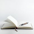 An open notebook with lined pages lies on a flat surface. A page is partially turned, Royalty Free Stock Photo