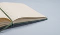 Open notebook on office desk, side view, close up Royalty Free Stock Photo