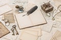 Open notebook, old letters and accessories Royalty Free Stock Photo