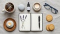 Open notebook with a pen and lavender sprigs on a linen surface. Surrounding items include a Royalty Free Stock Photo
