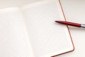 Open notebook with pen on white background closeup Royalty Free Stock Photo