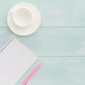 Open notebook with pink pen and coffeecup Royalty Free Stock Photo
