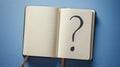 Open Notebook with Question Mark Royalty Free Stock Photo