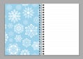 Open notebook realistic. Copybook or sketchbook, notepad or copybook with ring spiral bound pages and white snowflakes