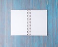 Open notebook on spring with white paper for notes and drawing. Royalty Free Stock Photo