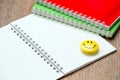 An open notebook on the table and two Notepad Royalty Free Stock Photo