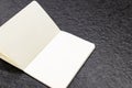 Open notebook with white pages on a black background. book for making business notes. No idea on the white sheet, pages without Royalty Free Stock Photo