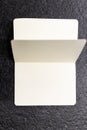 Open notebook with white pages on a black background. book for making business notes. No idea on the white sheet, pages without Royalty Free Stock Photo