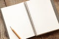 open notepad with blank pages, pencil for writing, space for text, retro style Royalty Free Stock Photo