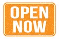 OPEN NOW, words on orange rectangle stamp sign Royalty Free Stock Photo