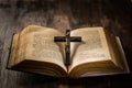 Open old bible with crucifix in vintage style Royalty Free Stock Photo