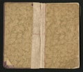Open old book isolated on black. grungy worn paper texture Royalty Free Stock Photo