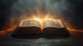 An open old book with light shining through its pages evokes knowledge Royalty Free Stock Photo
