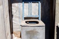 Open old dirty wooden abandoned toilet on countryside. Wooden toilet bowl Royalty Free Stock Photo