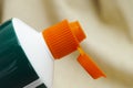 Open orange cap of toothpaste tube Royalty Free Stock Photo