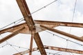Open overhead girders and trusses covered in rust