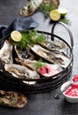 Open oysters with raspberry vinegar and shallots