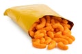 Open packet of extruded cheese puffs spilling out isolated on white Royalty Free Stock Photo