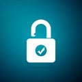 Open padlock and check mark icon isolated on blue background. Security check lock sign Royalty Free Stock Photo