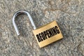 Open padlock, with `Reopening` written in black Royalty Free Stock Photo