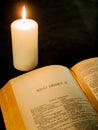 open page of the complete works of shakespeare and burning candle Royalty Free Stock Photo