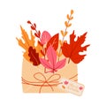 An open paper envelope with autumn leaves maple, branch of a plant. Autumn colors. Signed Hello Autumn .