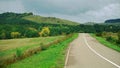 An open paved road leads into the distance.A dirt road in a forest thicket.the concept of Royalty Free Stock Photo